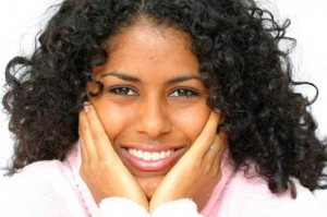 happy woman pink sweater