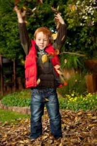 Happy Red Haired Little Boy